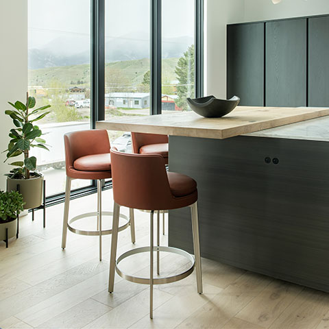 modern kitchen in bozeman montana featuring poliform cabinetry and flexform feel good counter stools