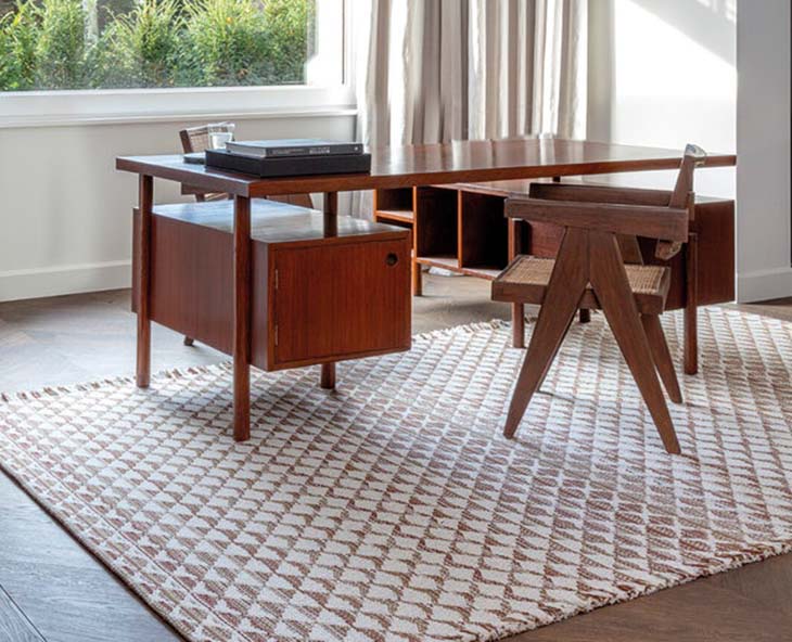 home office featuring a limited edition rug