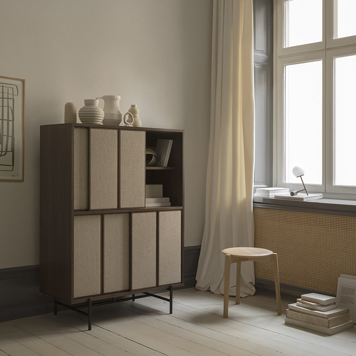 l.ercolani canvas tall cabinet in room with soft lighting