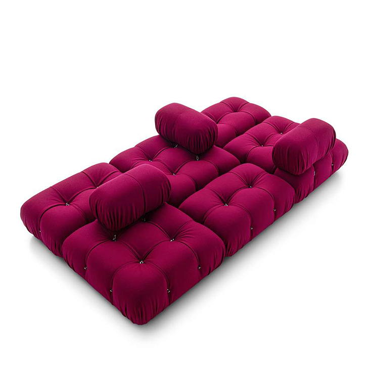 burgundy b&b italia camaleonda sofa on a white backgroun