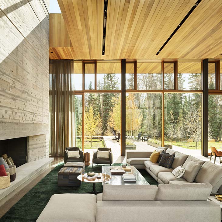 modern house in jackson wyoming featuring a minotti andersen sectional sofa