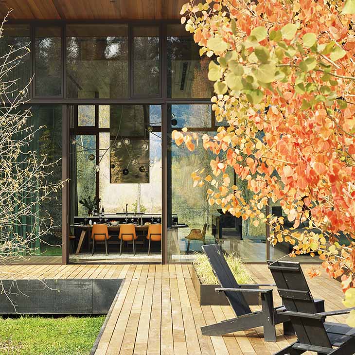 modern house in jackson wyoming featuring a De La Espada Together table and six Poliform Ventura chairs