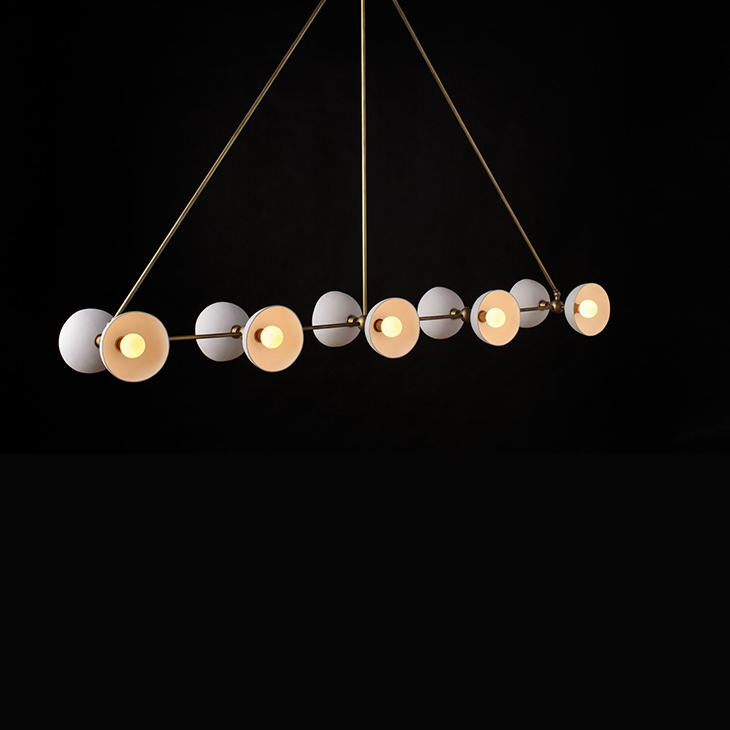 apparatus trapeze 10 pendant light on a black background