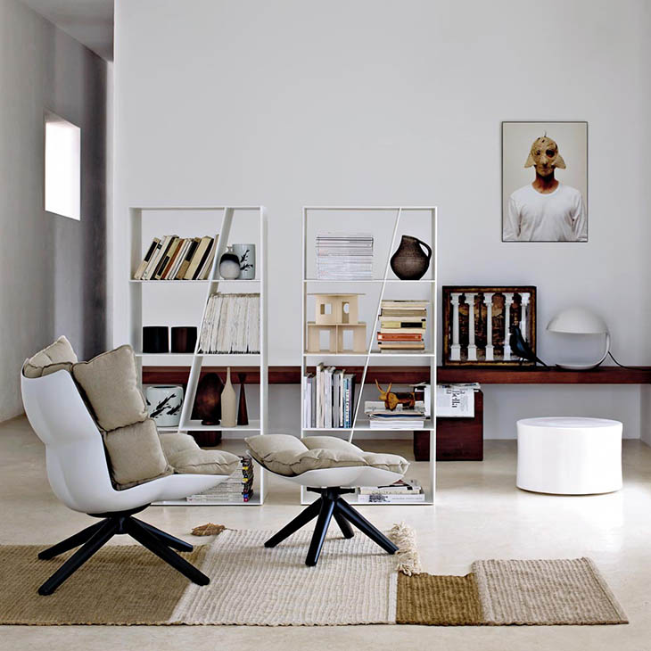 modern living room featuring b&b italia husk armchair and ottoman
