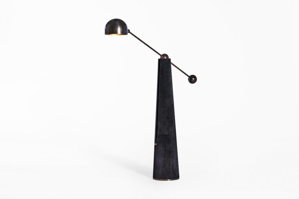 apparatus metronome articulating floor lamp on a white background