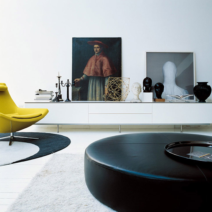 modern living room featuring a b&b italia harry large ottoman