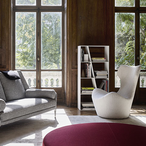 modern living room featuring a b&b italia harry large ottoman