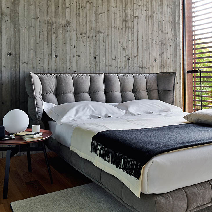modern bedroom featuring b&b italia husk bed