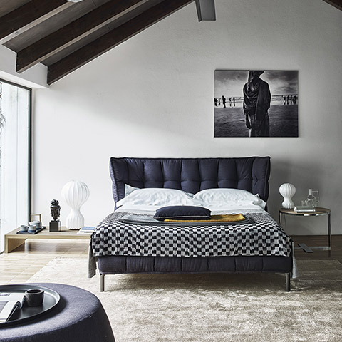 modern bedroom featuring b&b italia husk bed
