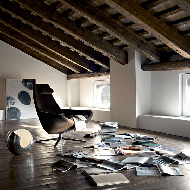 modern loft space featuring b&b italia metropolitan armchair