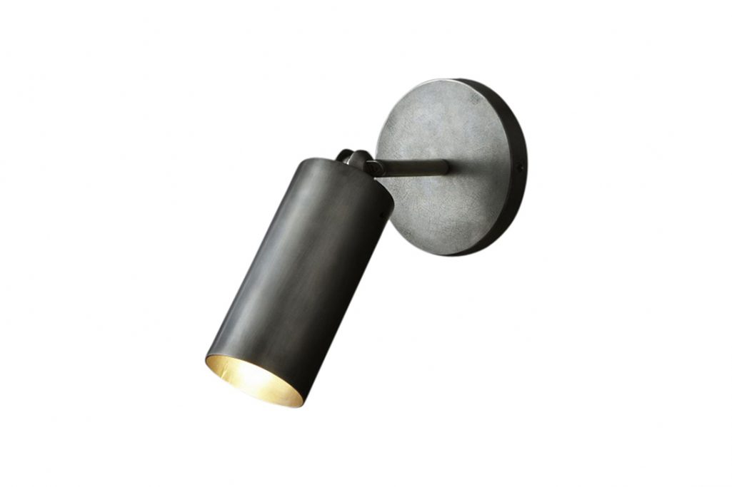 apparatus cylinder sconce on a white background