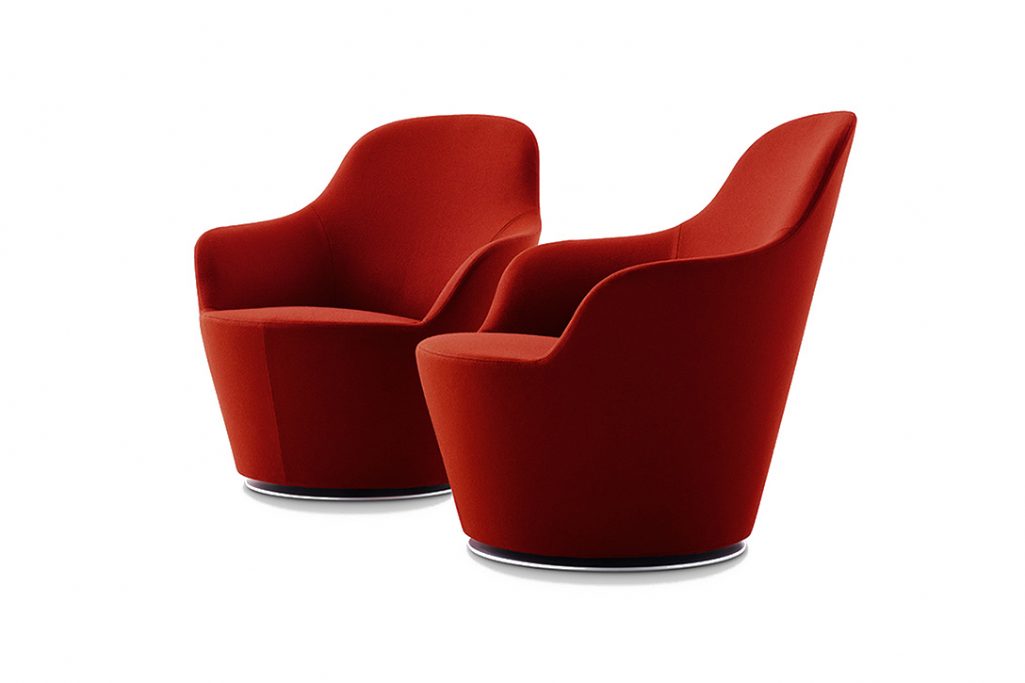 two red b&b italia harbor armchairs on a white background