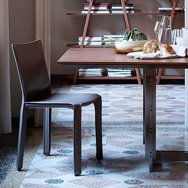 modern dining room featuring cassina cab dining chair