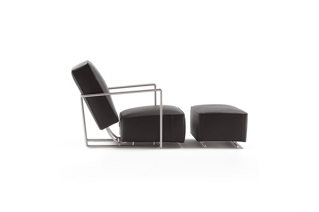 flexform abc armchair and ottoman on a white background