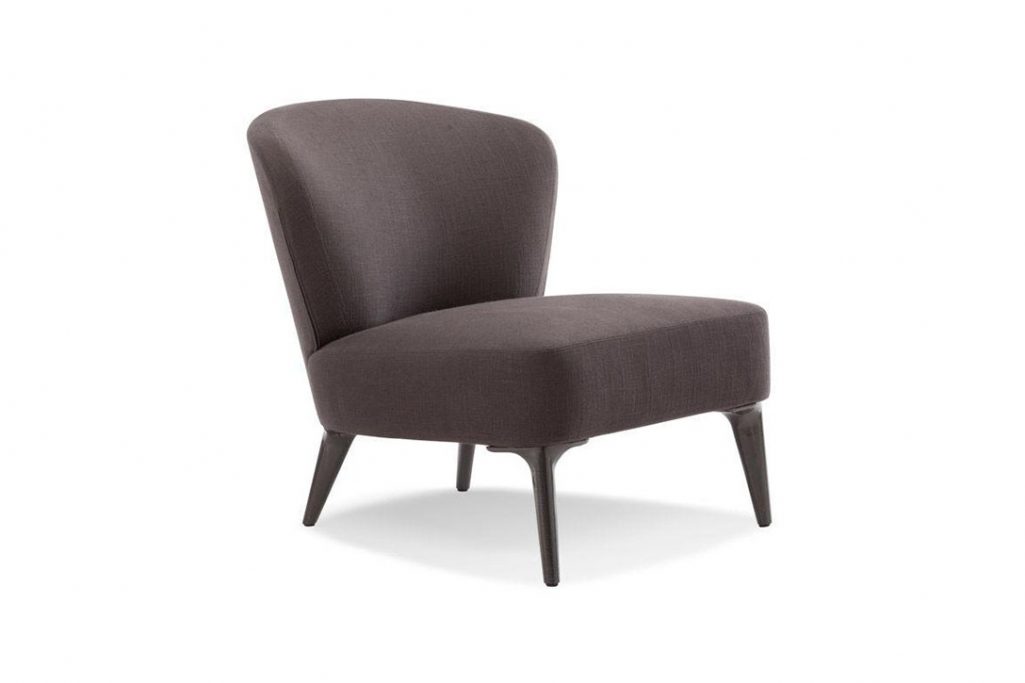 minotti aston armchair without armrests on a white background