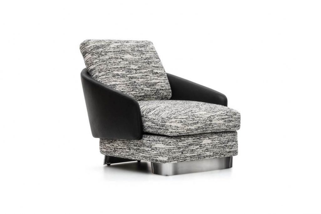 minotti lawson armchair on a white background