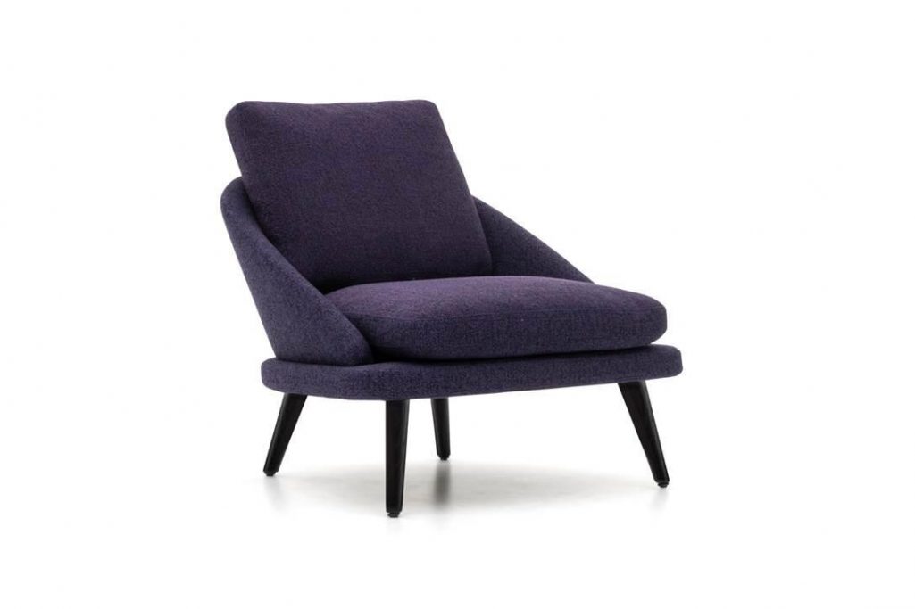 minotti lawson armchair with wood legs on a white background