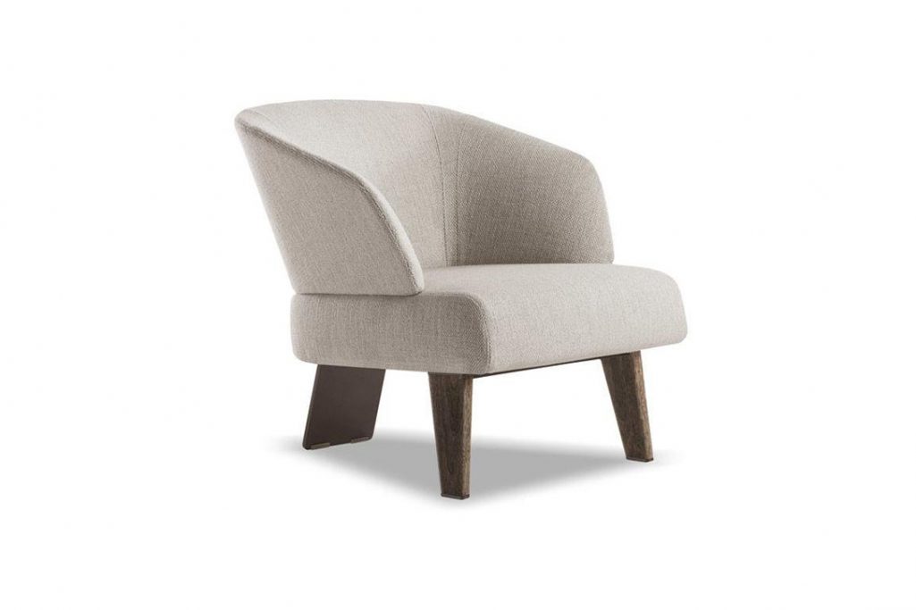 minotti reeves small armchair with fixed base on a white background