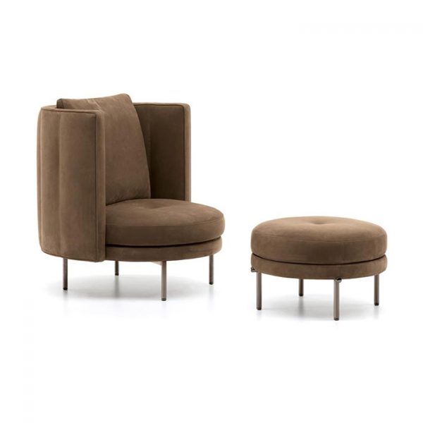 minotti torii armchair and ottoman on a white background