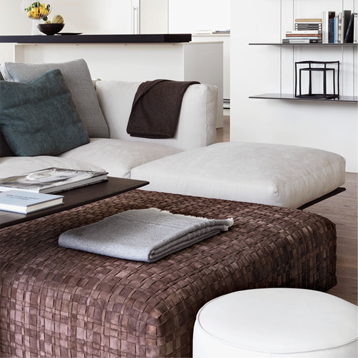 modern living room featuring a flexform bangkok ottoman