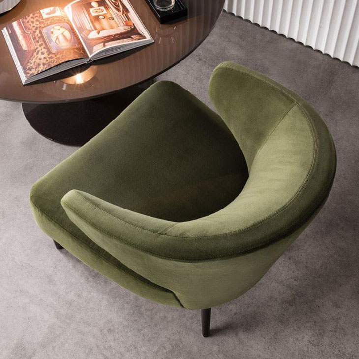 modern sitting area featuring minotti aston armchair