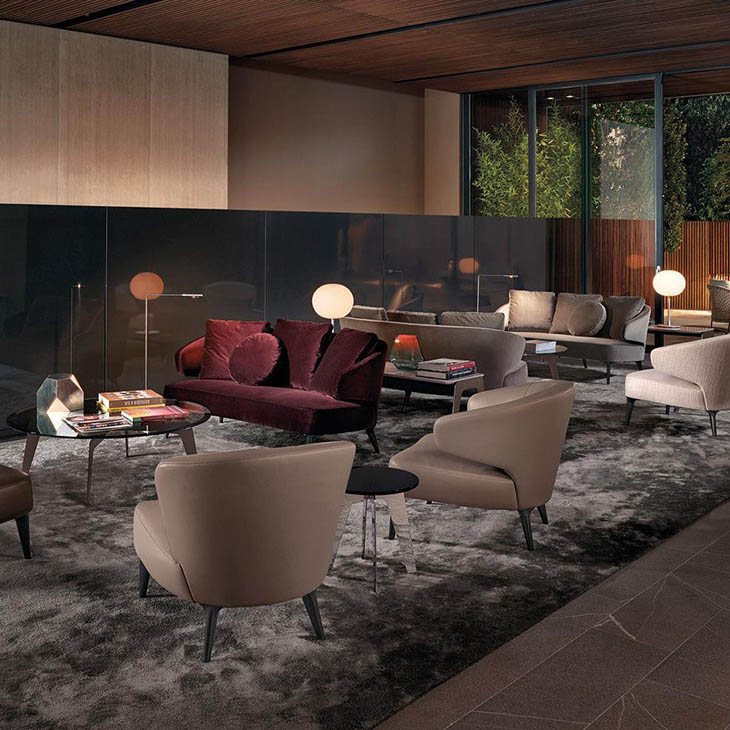 modern lobby featuring minotti aston sofas and armchairs
