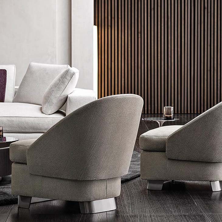 modern living room featuring two minotti lawson armchairs