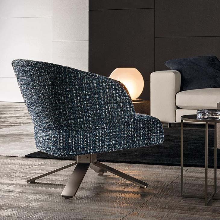 modern living room featuring minotti reeves small armchair