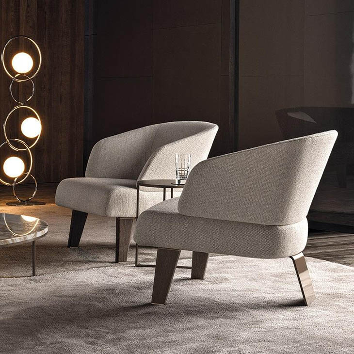 modern living room featuring minotti reeves small armchair