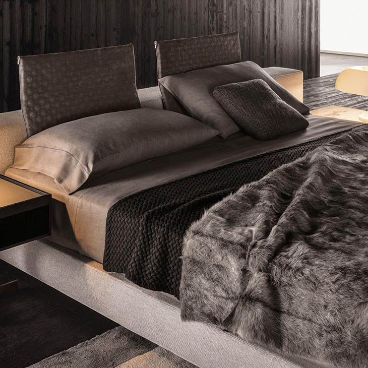 modern bedroom featuring minotti yang bed