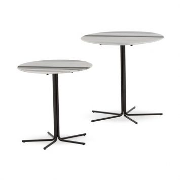 two minotti rays side tables on a white background