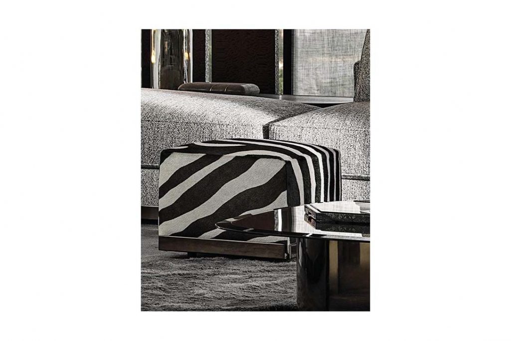 modern living room featuring minotti west poufs