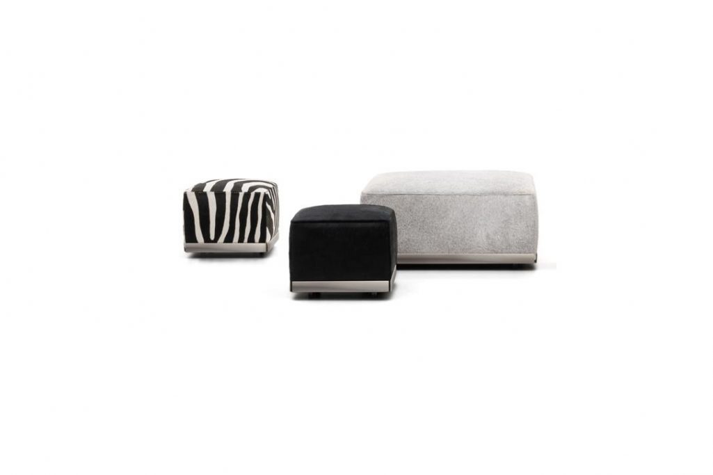 three minotti west poufs on a white background