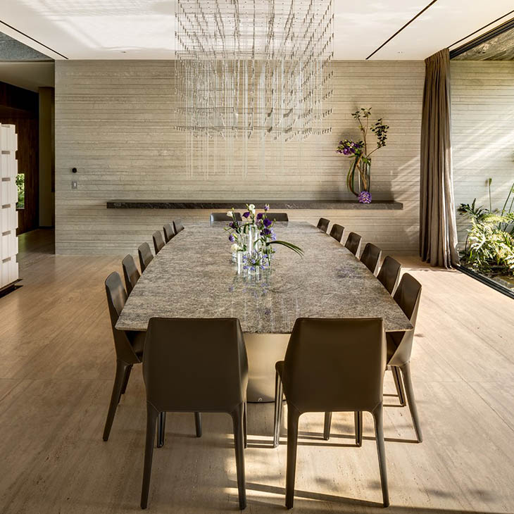 modern dining room featuring flexform isabel dining chairs
