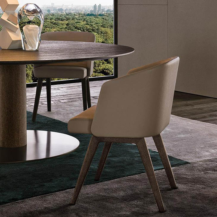 modern dining room featuring a minotti bellagio dining table