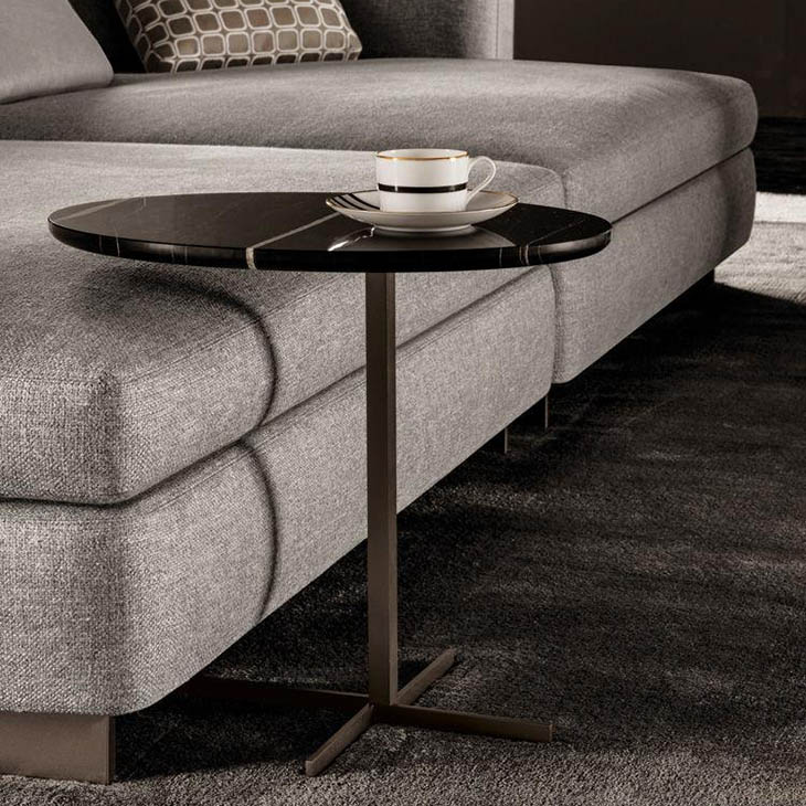 modern living room featuring a minotti joy jut out side table