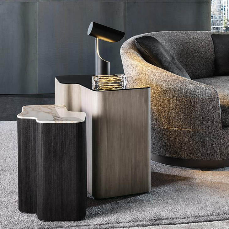 modern living room featuring two minotti lou tables