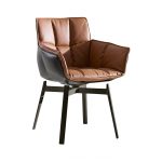 b&b italia husk chair with metal base on a white background