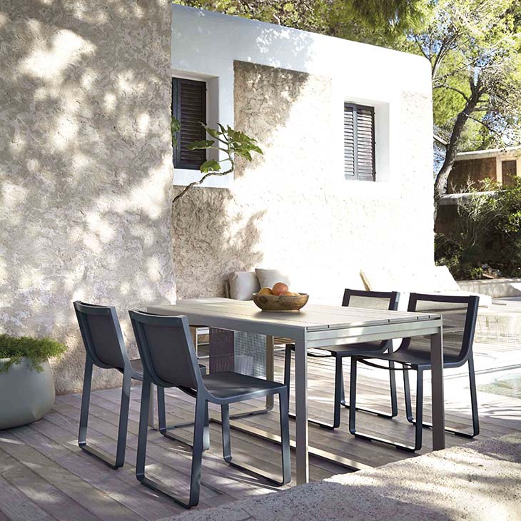 gandia blasco flat outdoor dining table and chairs in situ