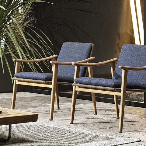 minotti fynn outdoor armchairs little in situ