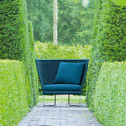 paola lenti ami outdoor armchairs in situ