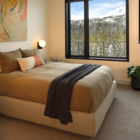 mountain modern bedroom featuring smart home technology at 232 lake lodge moonlight basin big sky, mt
