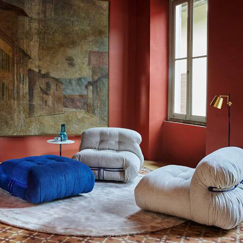 cassina soriana armchair, chaise longue, and pouf in situ