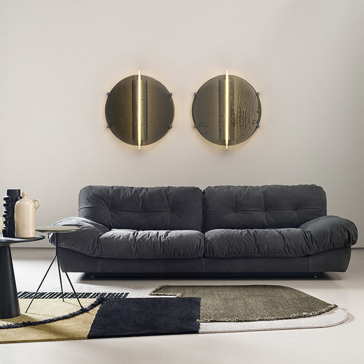 baxter nanda wall light and milano sofa in situ
