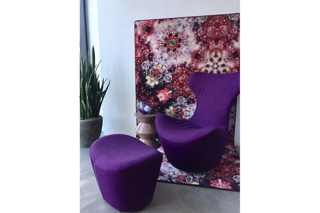 grande papilio armchair and ottoman in situ