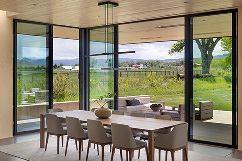 poliform blade table and grace chairs at 63rd street ranch in boulder co