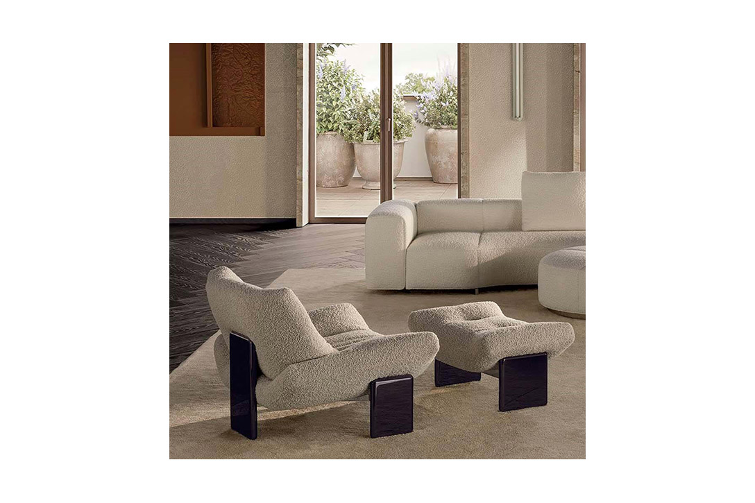 minotti emmi armchair and emmi footstool in situ